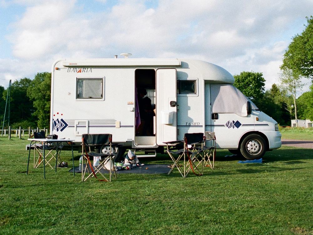 Coachbuilt motorhome parked on grass